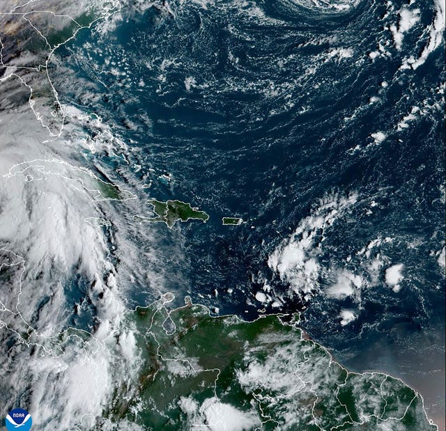 A satellite image shows Tropical Storm Helene in the Caribbean Sea