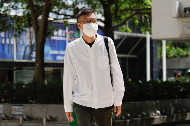 Patrick Lam, the former acting editor-in-chief of Hong Kong’s now shuttered pro-democracy news outlet Stand News, arrives at the District Court in Wan Chai, Hong Kong, ahead of a sentencing hearing for two former Stand News editors convicted of sedition