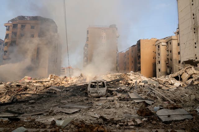 Smoke rises from destroyed buildings in Beirut’s southern suburbs on Saturday morning 