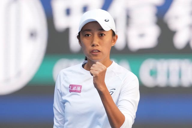 Zhang Shuai of China celebrates after winning a point against Magdalena Frech of Poland