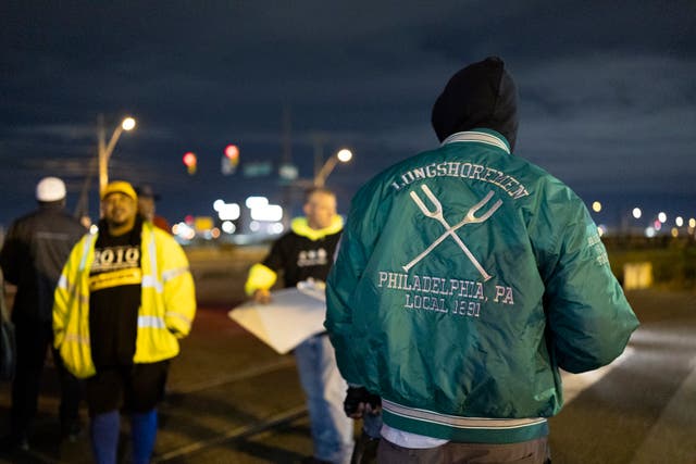 Philadelphia longshoremen assembled outside the Packer Avenue Marine Terminal Port begin to strike 