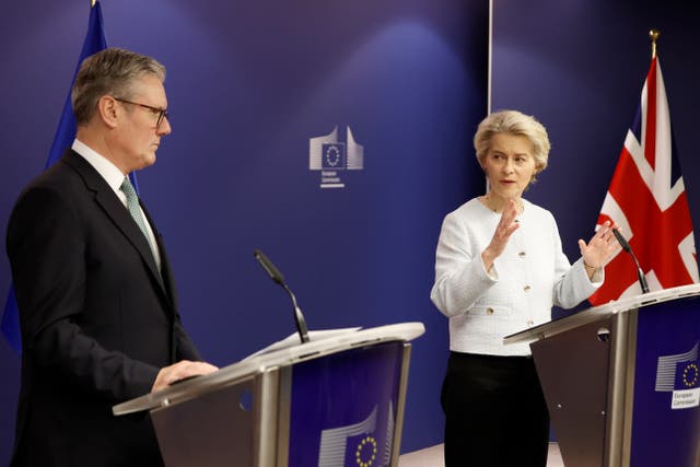 Sir Keir Starmer and Ursula von der Leyen stand at lecterns