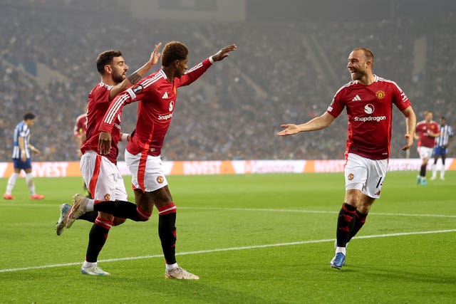 Marcus Rashford celebrates the opening goal 