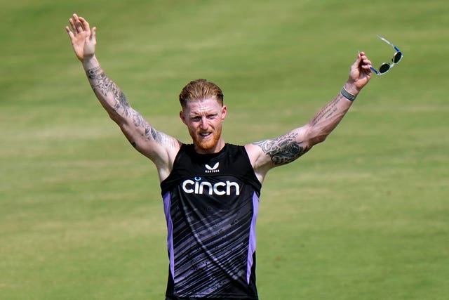 Ben Stokes gestures toward teammate