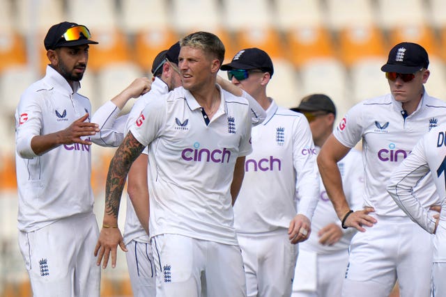 Brydon Carse with England team-mates after taking the wicket of Pakistan’s Aamer Jamal