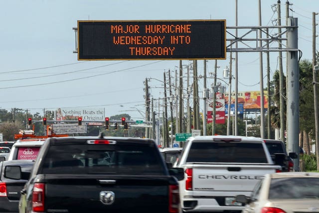 Road signs warn of the impending hurricane