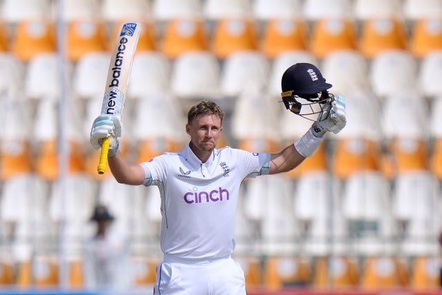 Joe Root raises his bat in Multan