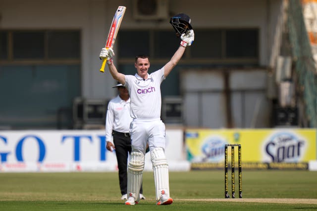 Harry Brook celebrates with both arms in the air