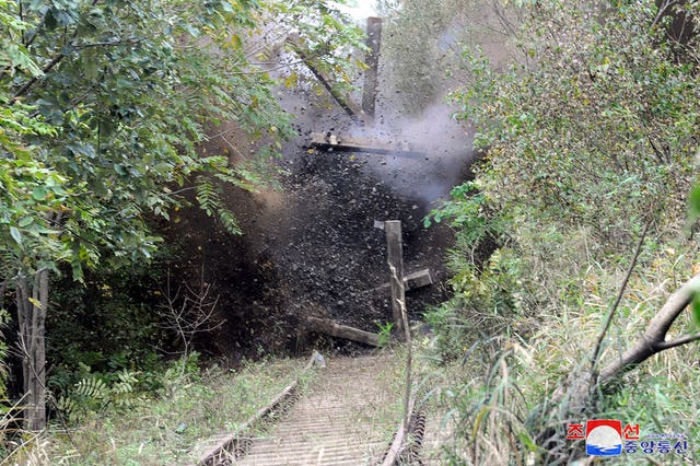  North Korean government picture showing demolition of parts of the northern sections of unused road and rail links that once connected the country with the South