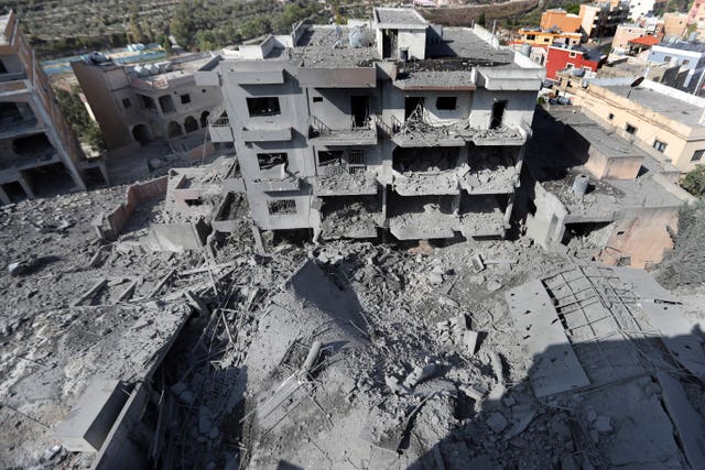 Destroyed buildings that were hit by Israeli air strikes in Qana, south Lebanon