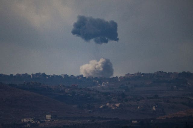 Smokes rise following an explosion in southern Lebanon as seen from northern Israel on Thursday 