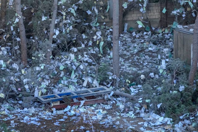 Documents are scattered after a strike on one branch