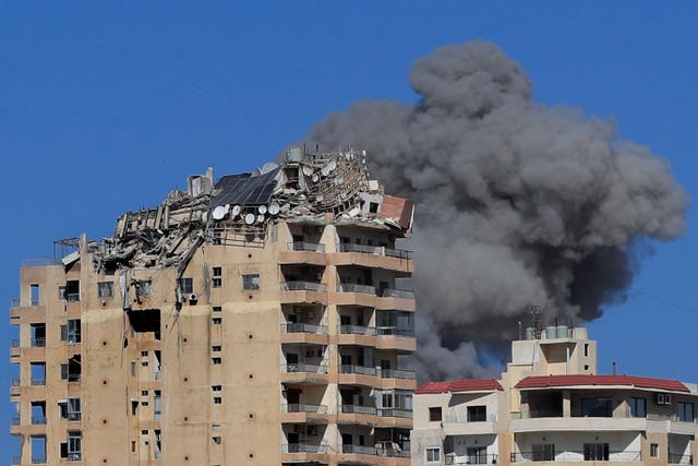 Smoke rises from a building