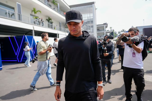 McLaren driver Lando Norris arrives at the circuit in Mexico City 