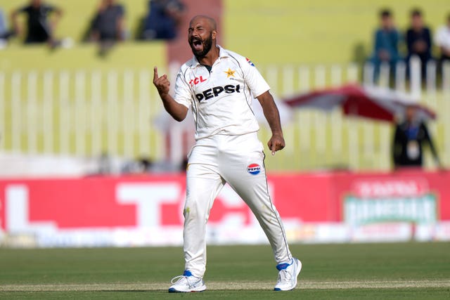 Pakistan spinner Sajid Khan roars with delight and sticks his finger up after taking a wicket against England