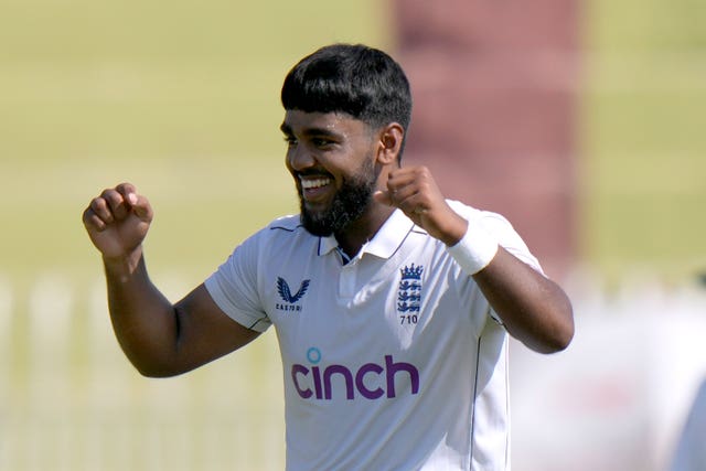 Rehan Ahmed raises his fists in celebration