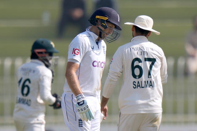 Joe Root reacts as he walks off the field after his dismissal 