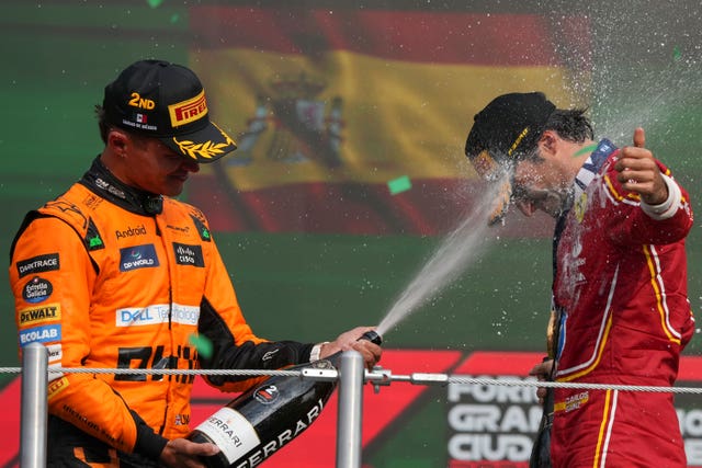 Norris sprays Sainz with champage