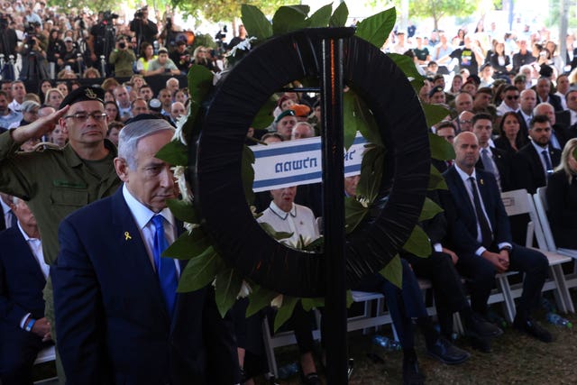 Israel’s Prime Minister Benjamin Netanyahu takes part in a ceremony at the Mount Herzl military cemetery