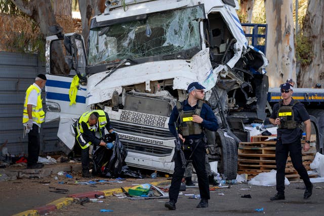 Police around smashed truck