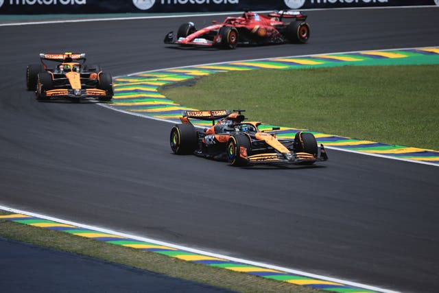 Oscar Piastri, bottom, leads McLaren team-mate Lando Norris and Ferrari's Charles Leclerc in the Brazilian Grand Prix sprint race