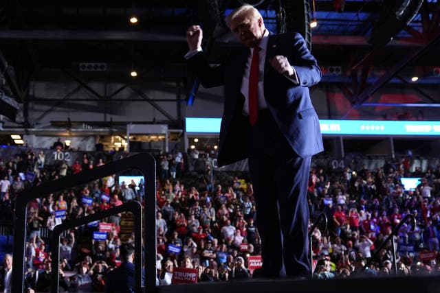 Republican presidential nominee Donald Trump dances during a campaign rally at Santander Arena in Reading, Pennsylvania