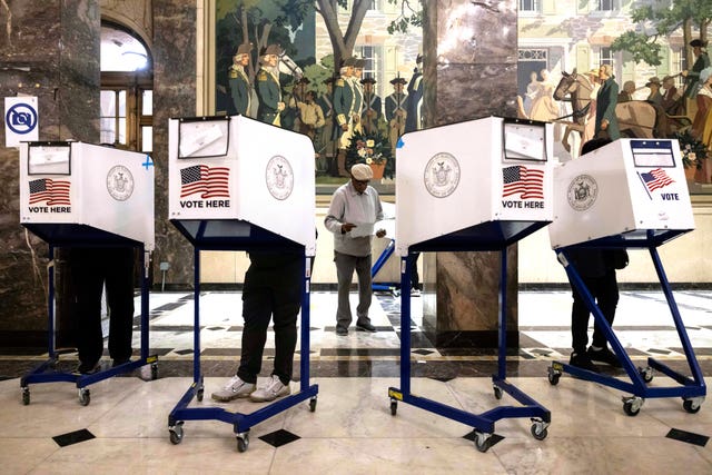 Voters cast their ballots at the Bronx County Supreme Court in New York on Election Day