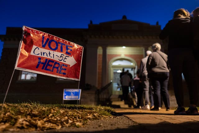 Voters line up to enter their polling place at the Cincinnati Observatory on Election Day in Cincinnati