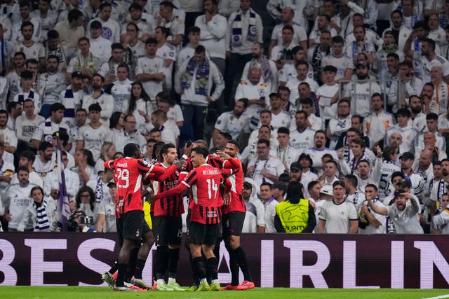 AC Milan celebrate a goal at the Bernabeu