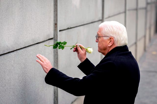 German President Frank-Walter Steinmeier attends a flower laying ceremony