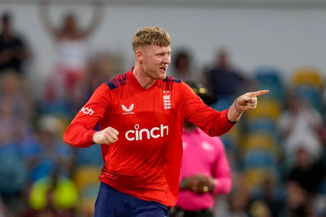 Dan Mousley celebrates taking a wicket