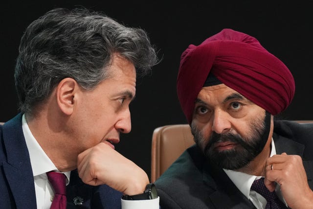 Ajay Banga, World Bank president, right, and Energy Secretary Ed Miliband speaking during a methane summit at Cop29