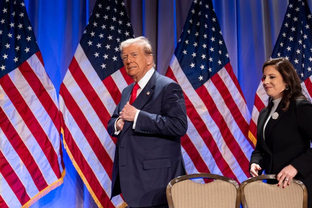 Donald Trump walks on stage followed by Elise Stefanik