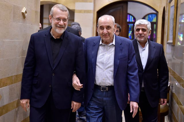 Lebanese parliament speaker Nabih Berri, centre, walks with Ali Larijani, an adviser to Iran’s supreme leader Ali Khamenei, in Beirut, Lebanon