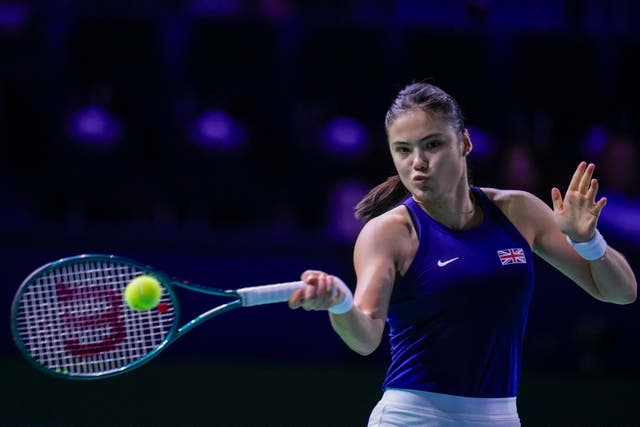 Emma Raducanu hits a forehand