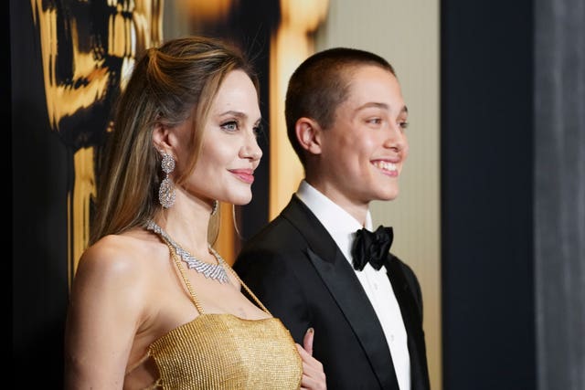 Angelina Jolie, left, and Knox Leon Jolie-Pitt arrive at the 15th Governors Awards at the Ray Dolby Ballroom in Los Angeles 