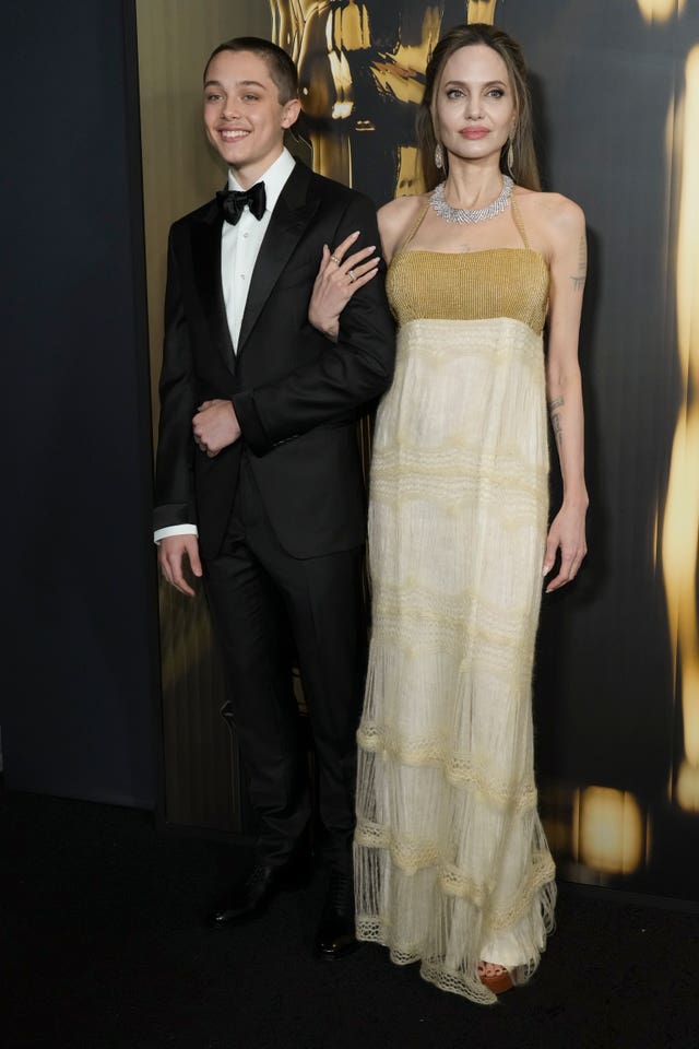 Angelina Jolie and her son smile on red carpet 15th Governors Awards