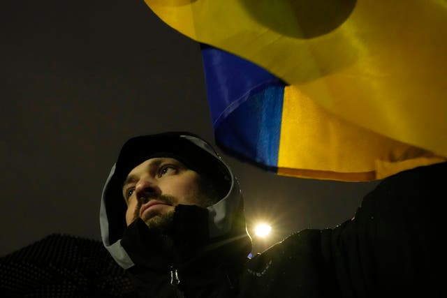 Protesters in Poland with Ukrainian colours