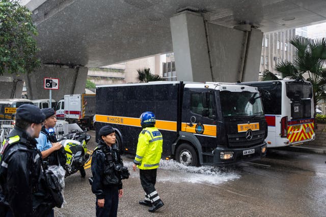 A vehicle arrives at court