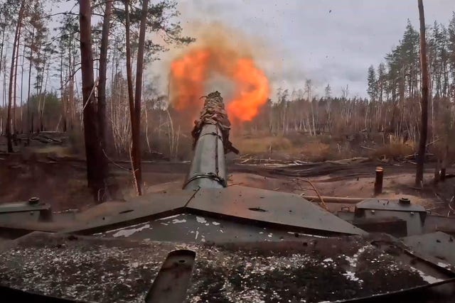 A Russian T90M Proryv tank fires towards Ukrainian positions 