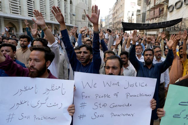 People with placards protest