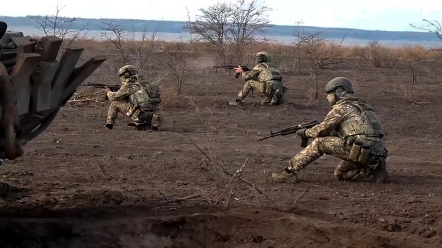 Russian servicemen attend a combat training for assault units in an undisclosed location