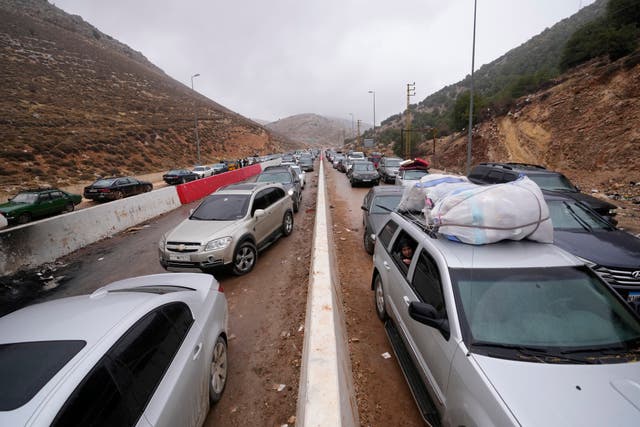 Displaced residents return from Syria in cars following a ceasefire between Israel and Hezbollah