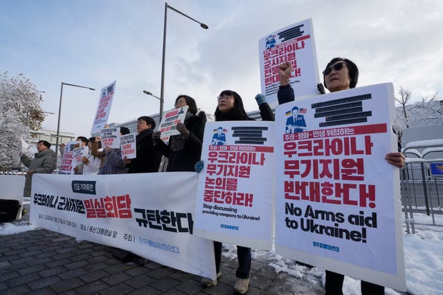 South Korean protesters stage a rally against their government’s plans to supply weapons to Ukraine,