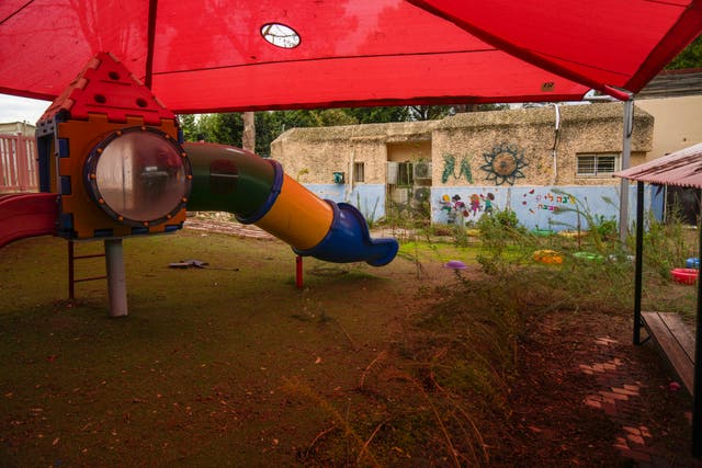 Weeds grow in a deserted playground in northern Israel