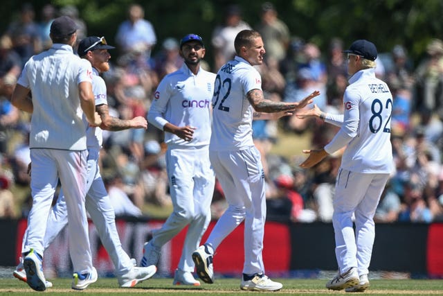 England players celebrate the wicket of New Zealand’s Nathan Smith