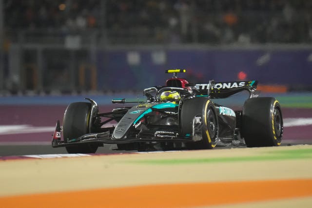 Lewis Hamilton races around a corner