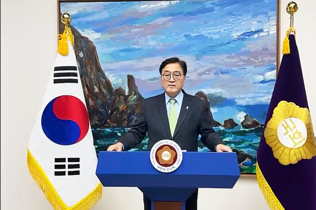 South Korea’s National Assembly speaker Woo Won-shik delivers a speech