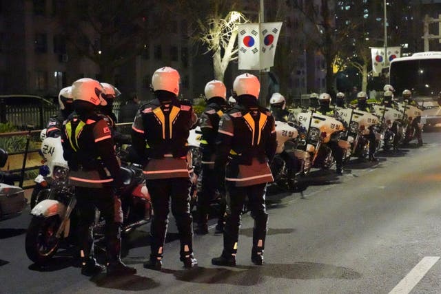 Military police bikes are seen outside of the National Assembly in Seoul, South Korea