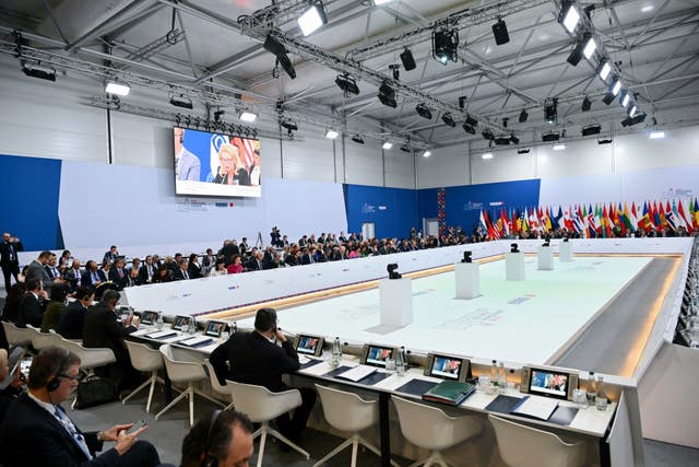 View of the meeting desk surround by ministers at the OSCE meeting